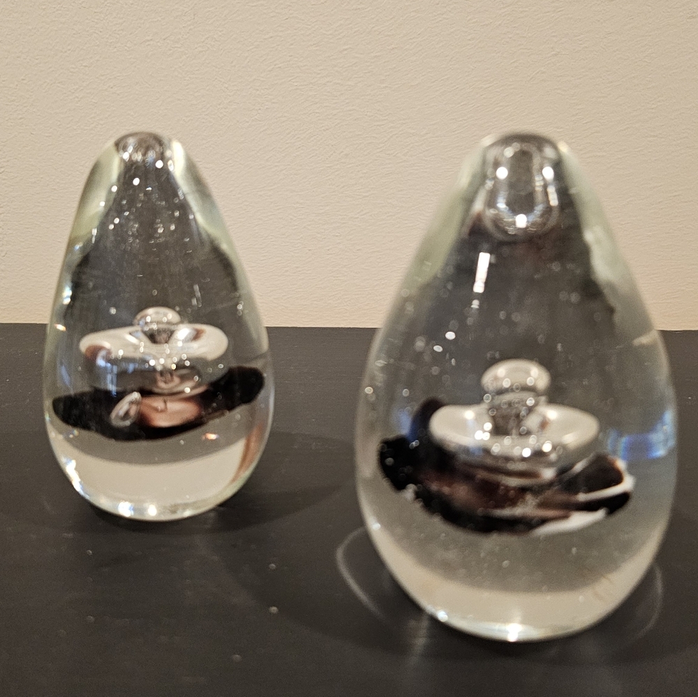 Vintage Pier 1 Imports egg-shaped clear art glass encased paperweights (2)